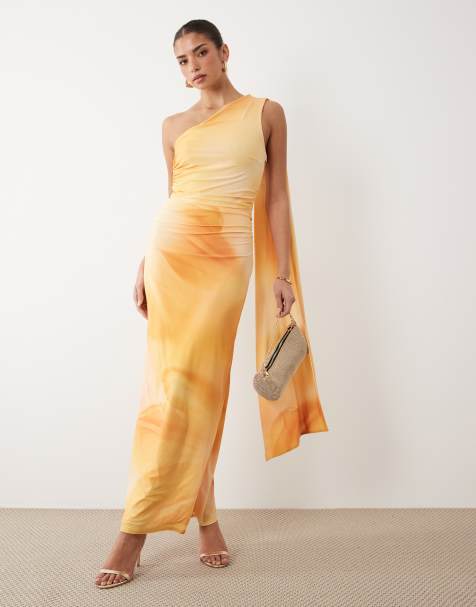 TFNC - Vestido largo amarillo asimétrico y ceñido con estampado abstracto y detalle colgante - view 1