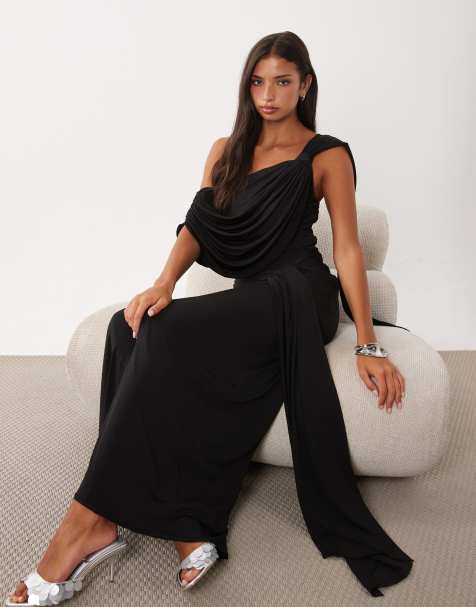 TFNC - Vestido maxi negro con drapeado fluido, hombros descubiertos y detalle de nudo - view 1