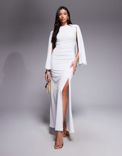 TFNC - Vestito lungo sinuoso color avorio con maniche a mantella e arricciature laterali