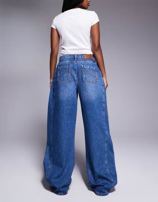 The Couture Club Adjustable Pleat Detail Wide Leg Jeans In Blue