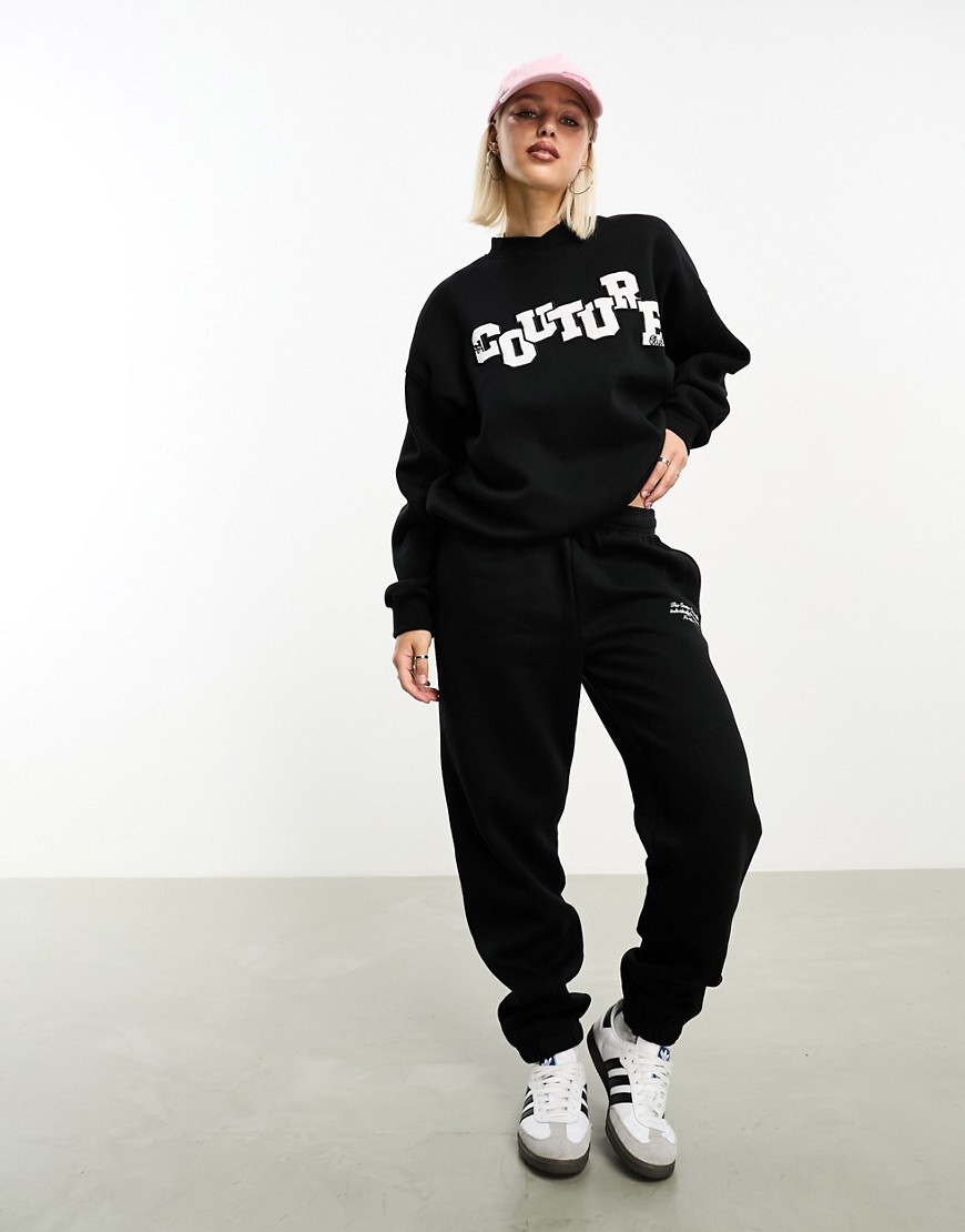 The Couture Club applique joggers in black