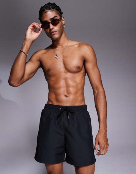 The Couture Club – Badeshorts in Schwarz mit Reactive-Emblem - view 1
