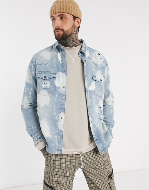 The Couture Club bleached denim shirt in light blue with distressing