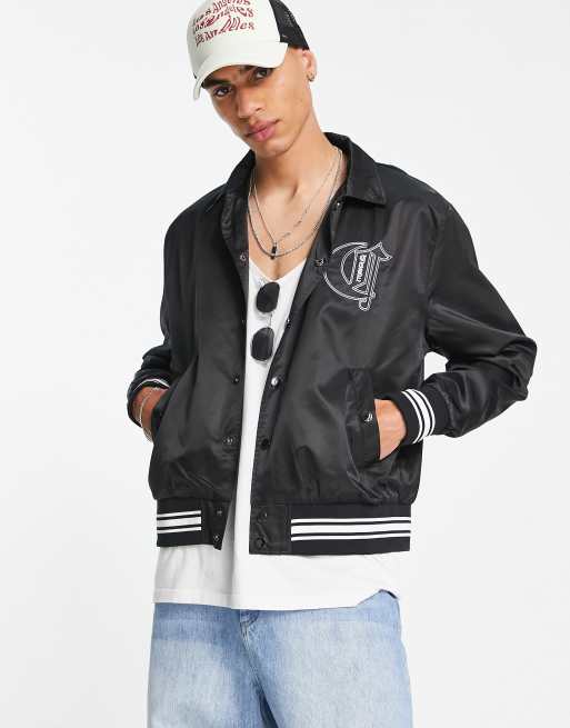 The Couture Club - Bomber en satin à écusson universitaire - Noir