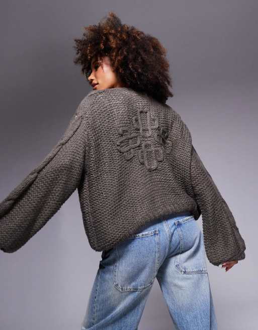 The Couture Club - Cardigan in maglia oversize color cacao con stemma 