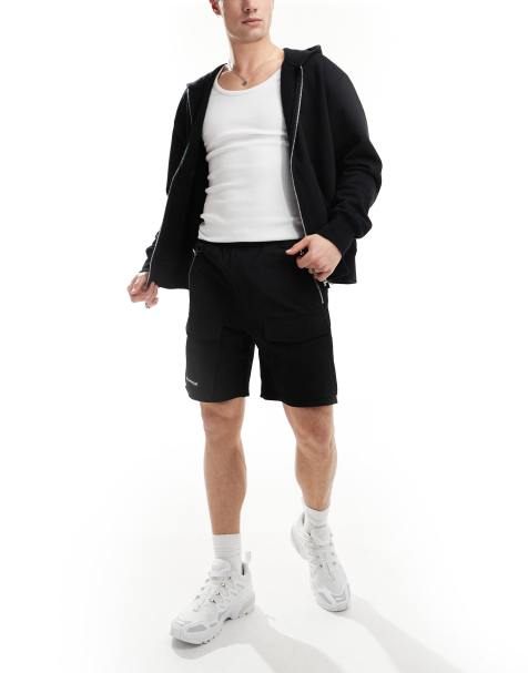 The Couture Club – Cargo-Shorts in Schwarz mit farblich abgesetztem Bahnendesign - view 1