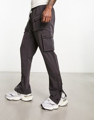 The Couture Club cargo trousers in charcoal with popper hem