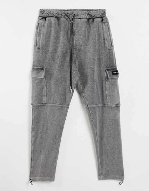 The Couture Club - Cargobroek van omgekeerde loopbackstof in zwart met acid wash
