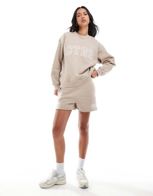 The Couture Club co-ord CTRE VARSITY crewneck set in beige