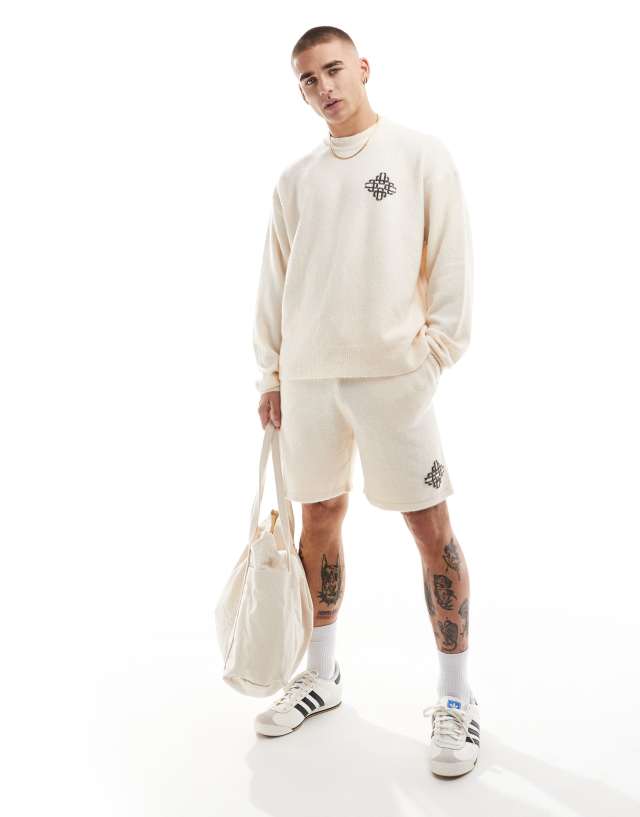 The Couture Club - co-ord emblem knitted crew set in off white