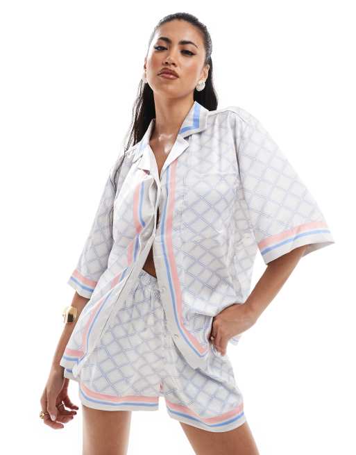 The Couture Club co-ord emblem print shirt in bue