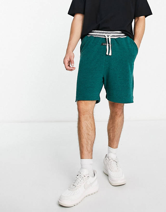 The Couture Club - co-ord jersey shorts in green teddy fleece