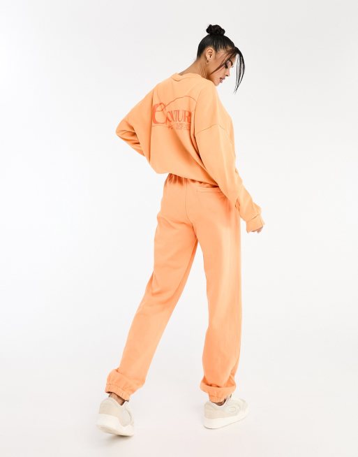 The Couture Club co-ord oversized joggers in orange, 3 of 4