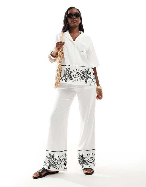 The Couture Club co-ord palm print embroidery wide leg trousers in white