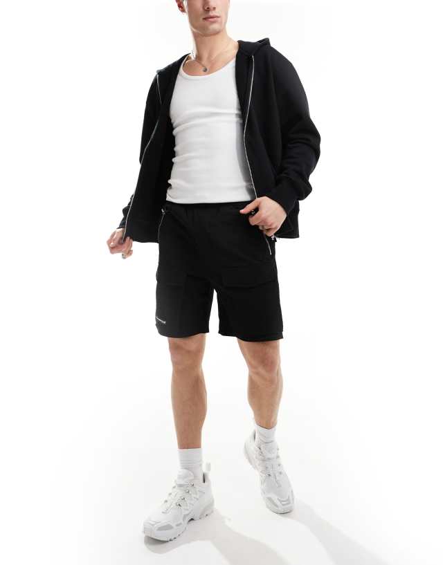 The Couture Club - contrast panelled cargo short in black