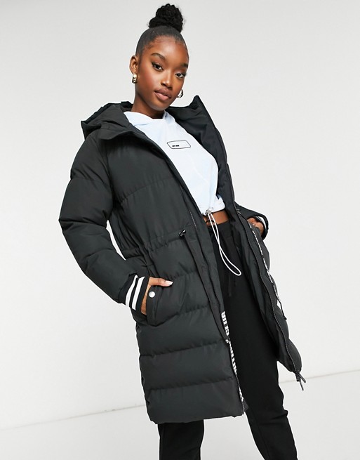The Couture Club contrast signature longline padded jacket in black
