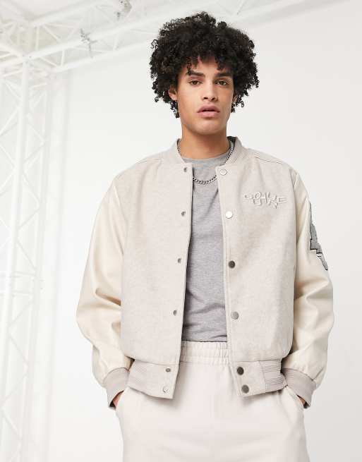 The Couture Club - Cremefarvet bomber-jakke med broderet collegemærker