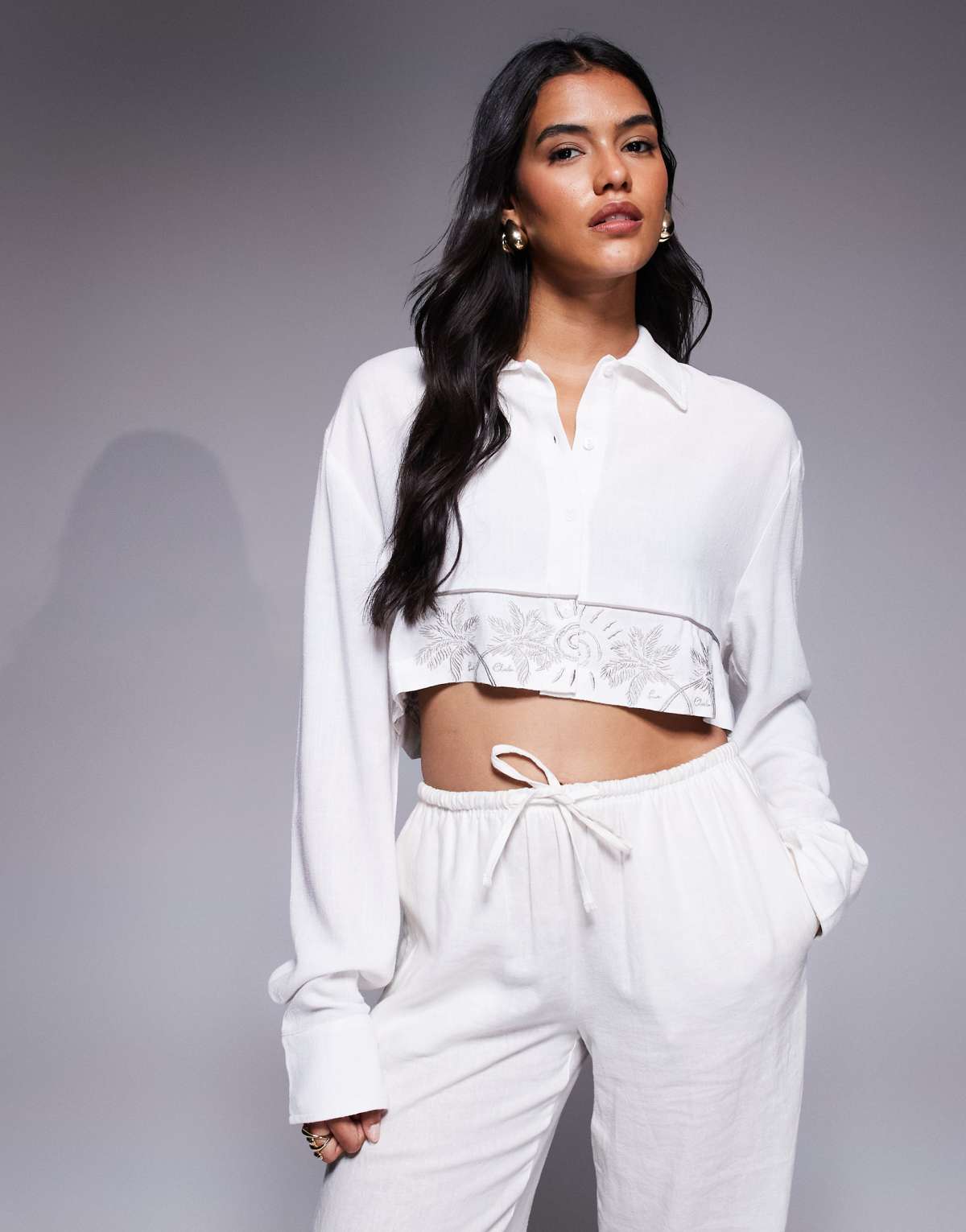 The Couture Club cropped shirt in off white with palm embroidery