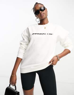 The Couture Club cropped sweatshirt co ord in white