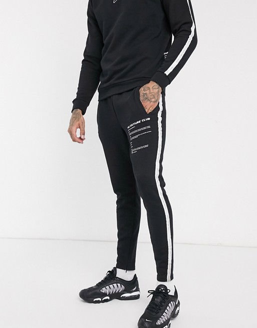 The Couture Club definition taped joggers in black