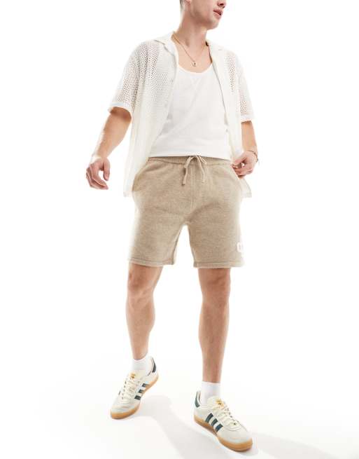 The Couture Club emblem knit shorts in beige | ASOS
