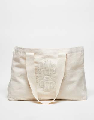 The Couture Club Emblem Logo Tote Bag In Off White