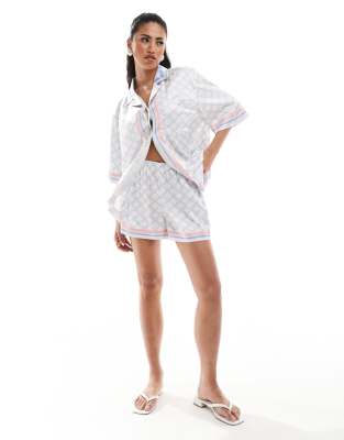 Шорты с принтом эмблемы Couture Club синего цвета - часть комплекта 9790₽