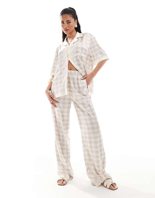 The Couture Club emblem print wide leg pants in beige - part of a set