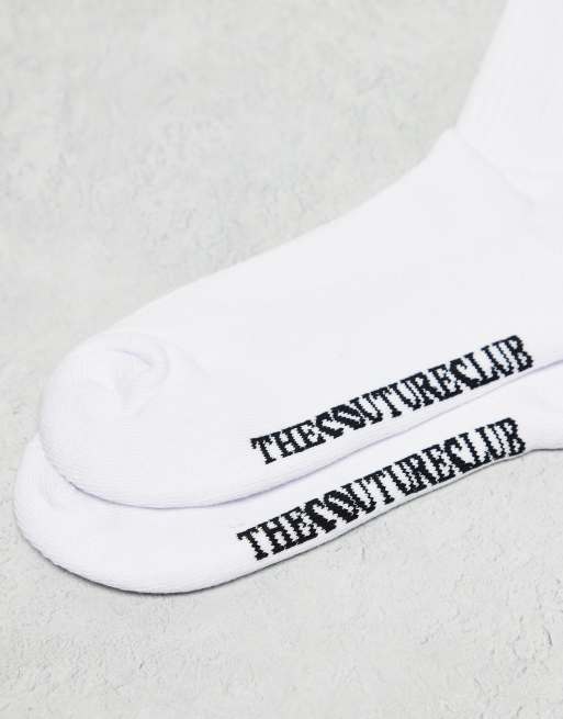 The Couture Club emblem socks in white, 2 of 3