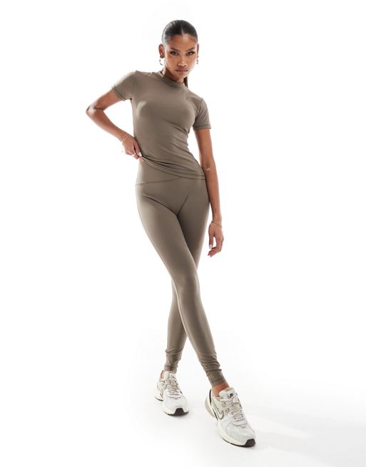 The Couture Club emblem soft touch lightweight leggings in brown