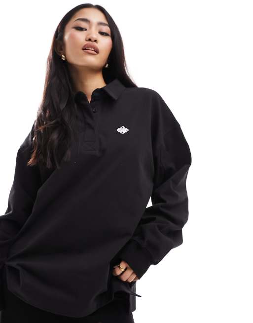 The Couture Club emblem waffle polo top in black