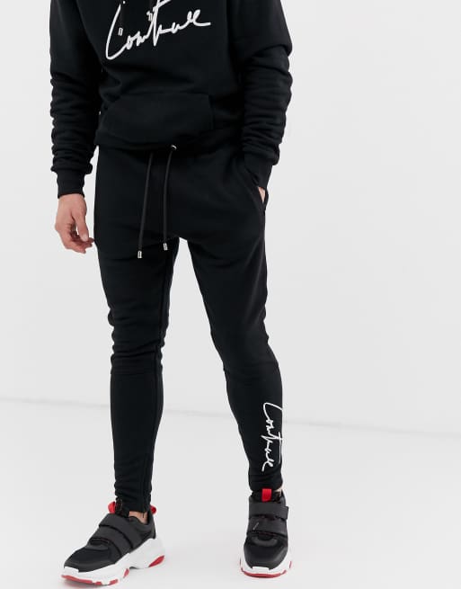 The Couture Club essential tracksuit in black