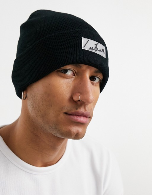 The Couture Club essentials beanie with rubber patch in black