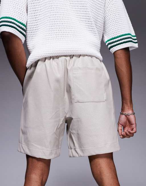 The Couture Club faux leather basketball shorts in stone