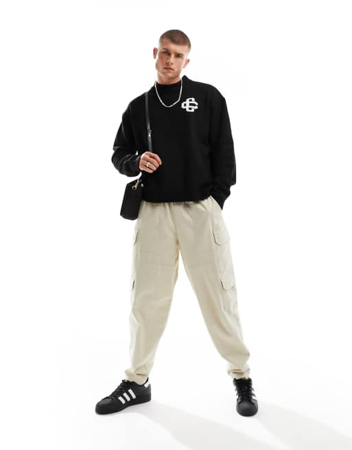 The Couture Club – Flauschiger Strickpullover in Schwarz mit Logo