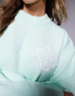 The Couture Club Fluffy Emblem Knit Sweater In Green