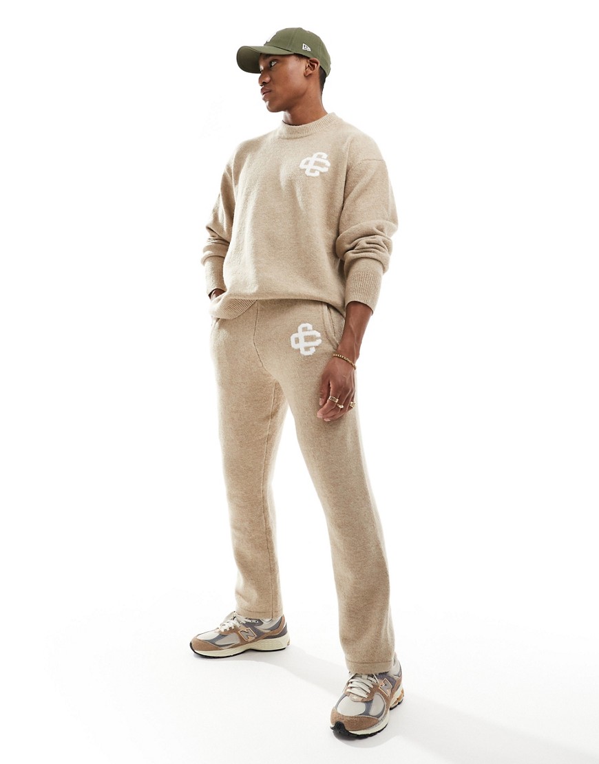 The Couture Club fluffy emblem knitted trouser in beige-Grey