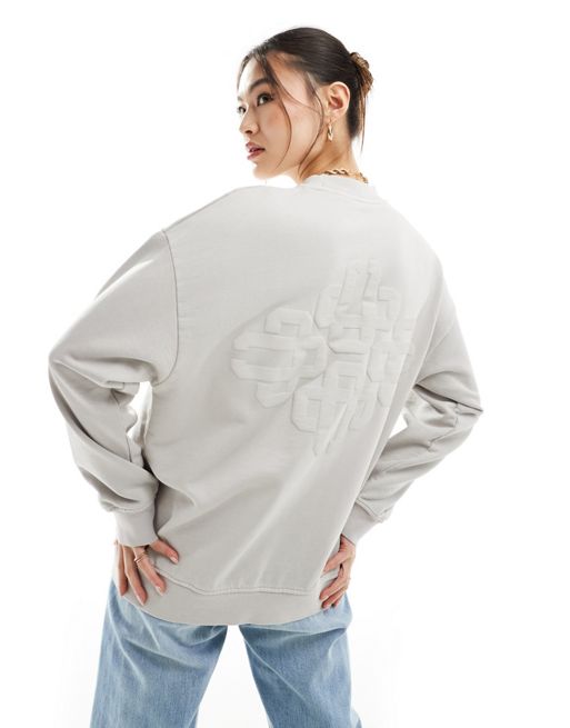The Couture Club - Grå sweatshirt med emblem-detalje