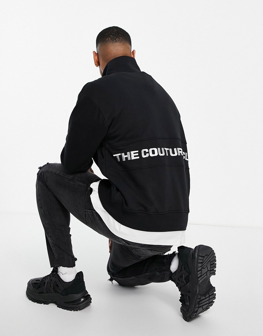 The Couture Club half zip sweatshirt in black with logo back print