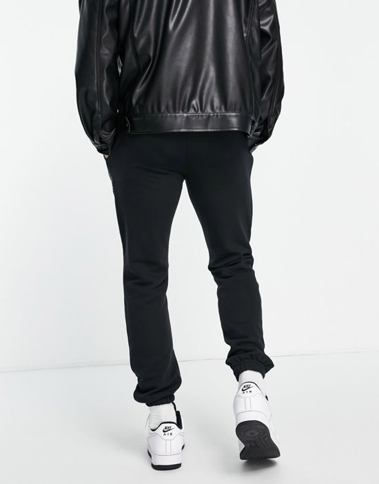 https://images.asos-media.com/products/the-couture-club-heritage-sweatpants-in-black/200249532-2?$n_550w$&wid=550&fit=constrain