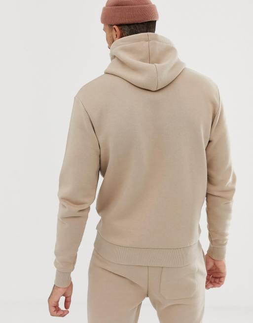 The Couture Club pullover hoodie in beige with photo back print