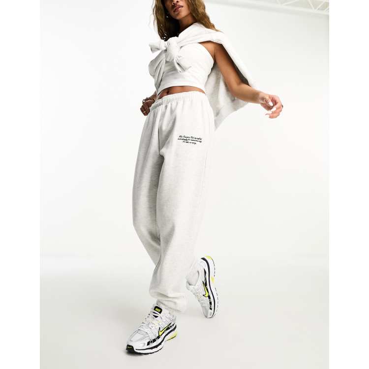 The Couture Club jersey sweatpants in gray with logo applique