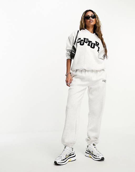 The Couture Club jersey sweatpants in gray with logo applique