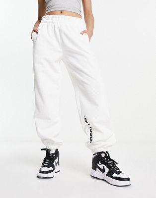 The Couture Club joggers co-ord in white