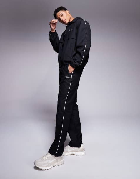 The Couture Club - Joggers eleganti neri con profili a contrasto in coordinato - view 1