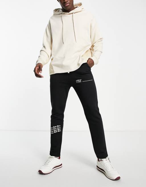 The Couture Club - Joggers neri dritti con ricamo in stile gotico in coordinato 