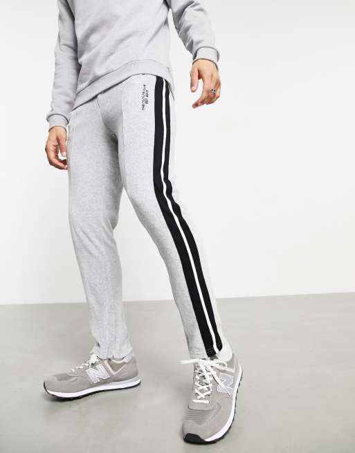 The Couture Club - Joggingbroek van velours met rechte pijpen en zijbies in grijs