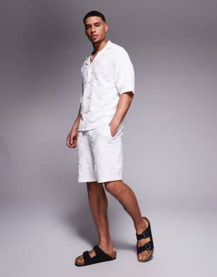 knit checkerboard shorts in off white - part of a set