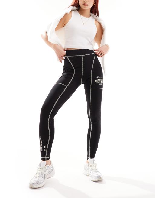 The Couture Club - Legging à coutures contrastantes et motifs graphiques oversize - Noir