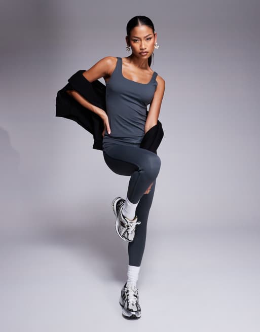 The Couture Club - Leggings modellanti elasticizzati color antracite con fascia in vita incrociata in coordinato